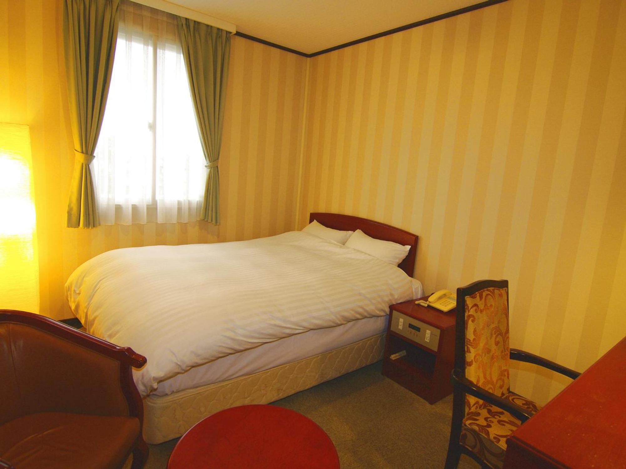 Tsukubanoyu Urban Hotel Quarto foto