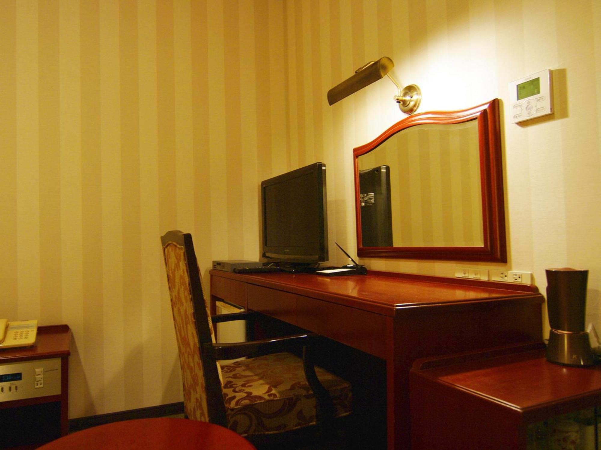 Tsukubanoyu Urban Hotel Quarto foto